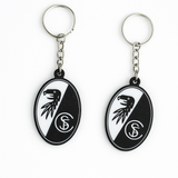 SC Freiburg Schlüsselanhänger aus PLA 3D-Druck in Schwarz, Weiß und Rot auf hellem Hintergrund